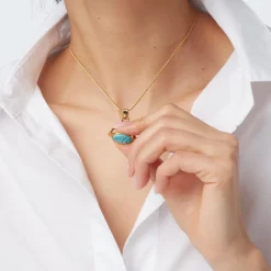 The Met Store Necklaces*Wedjat Eye Scarab Spinning Pendant Necklace